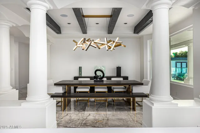 a view of walk in closet with clothes