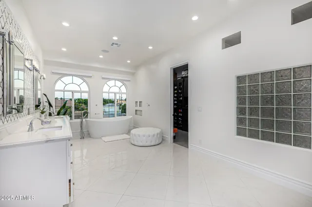 a view of a chairs and table in patio