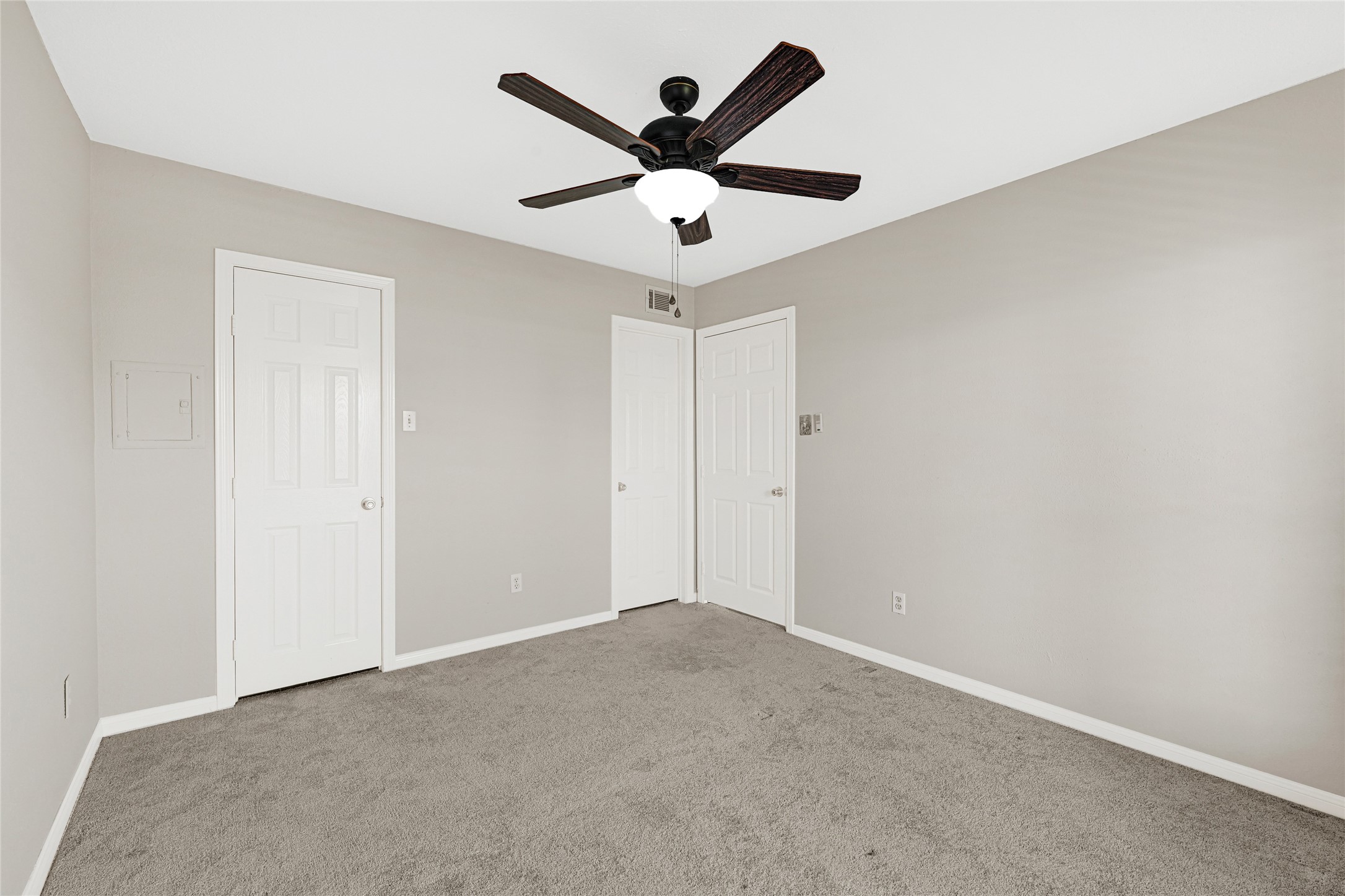 4011 NASA Road 1, Unit 406 El Lago, TX 77586 - Photo 13 of 23 an empty room with ceiling fan