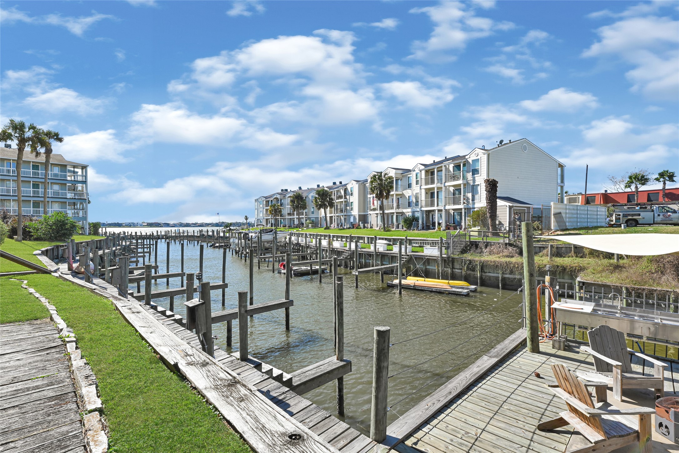 4011 NASA Road 1, Unit 406 El Lago, TX 77586 - Photo 18 of 23 a view of a lake with a terrace