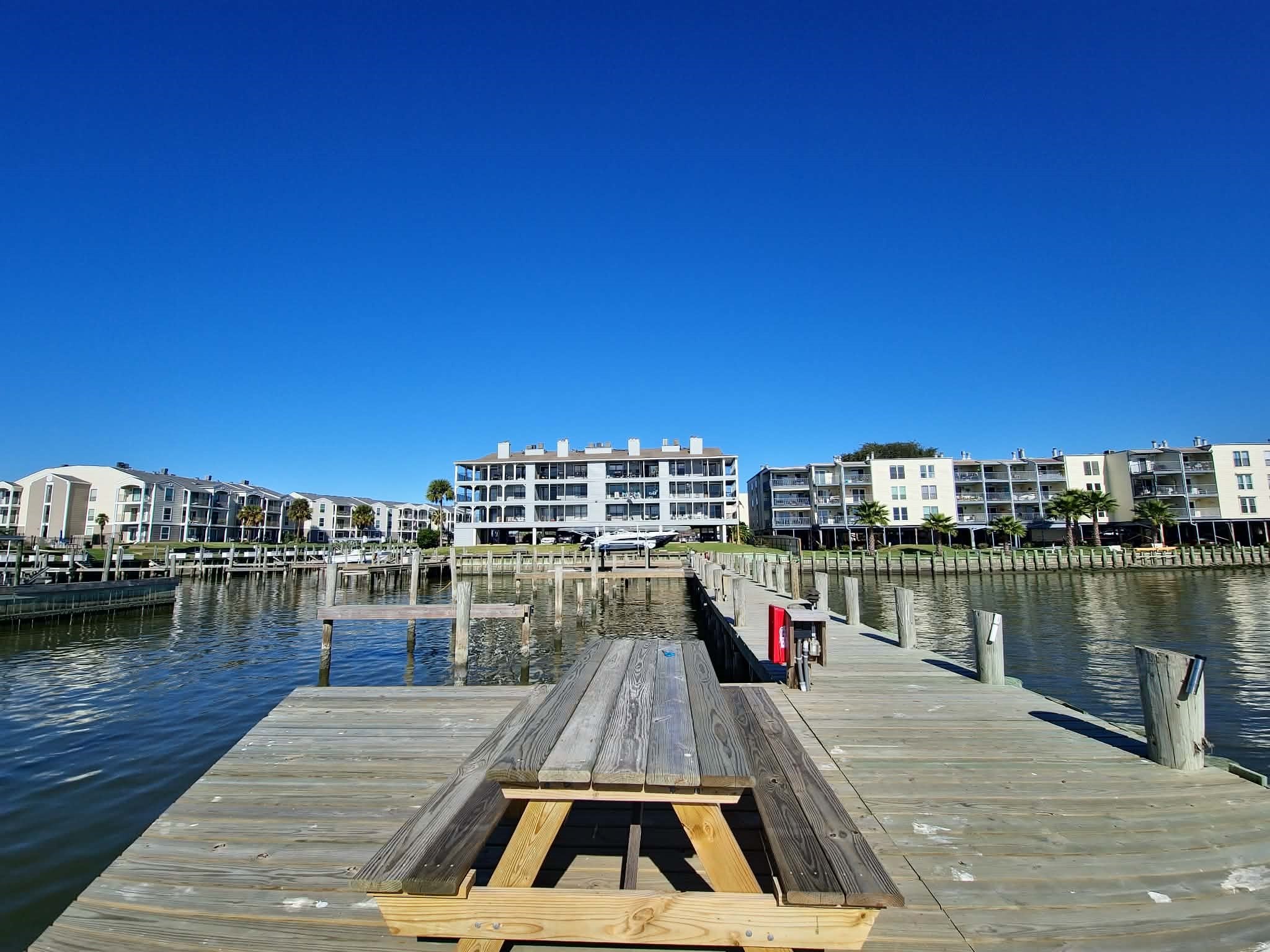 4011 NASA Road 1, Unit 406 El Lago, TX 77586 - Photo 22 of 23 a swimming pool view with a lake view