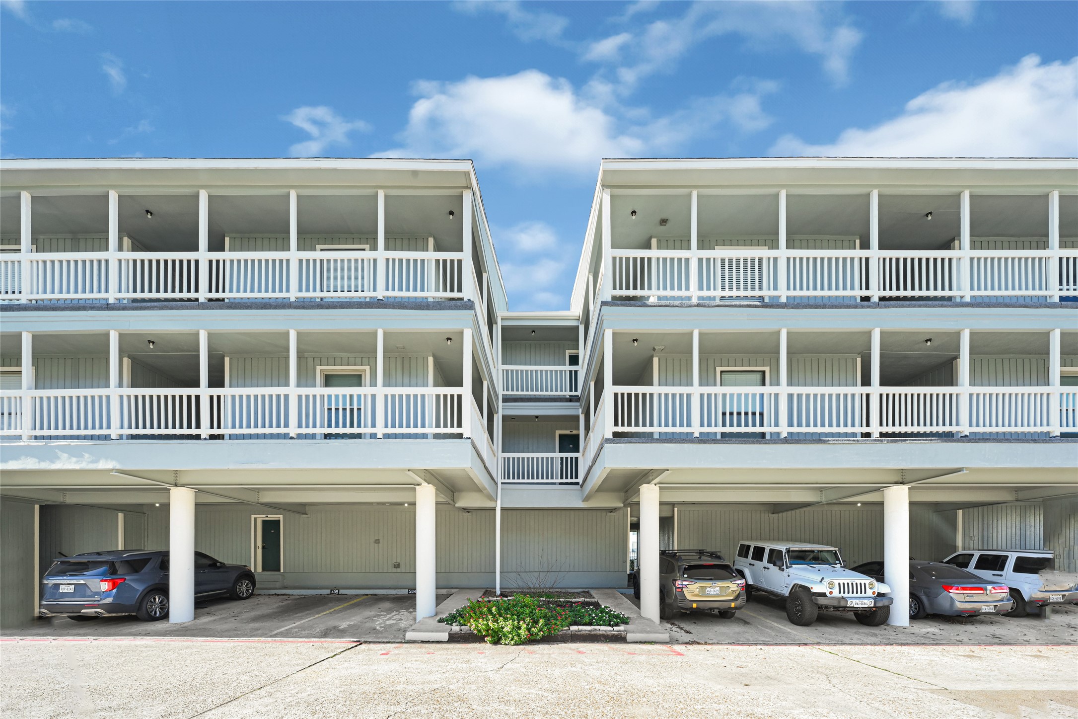 4011 NASA Road 1, Unit 406 El Lago, TX 77586 - Photo 3 of 23 a building with a lots of windows