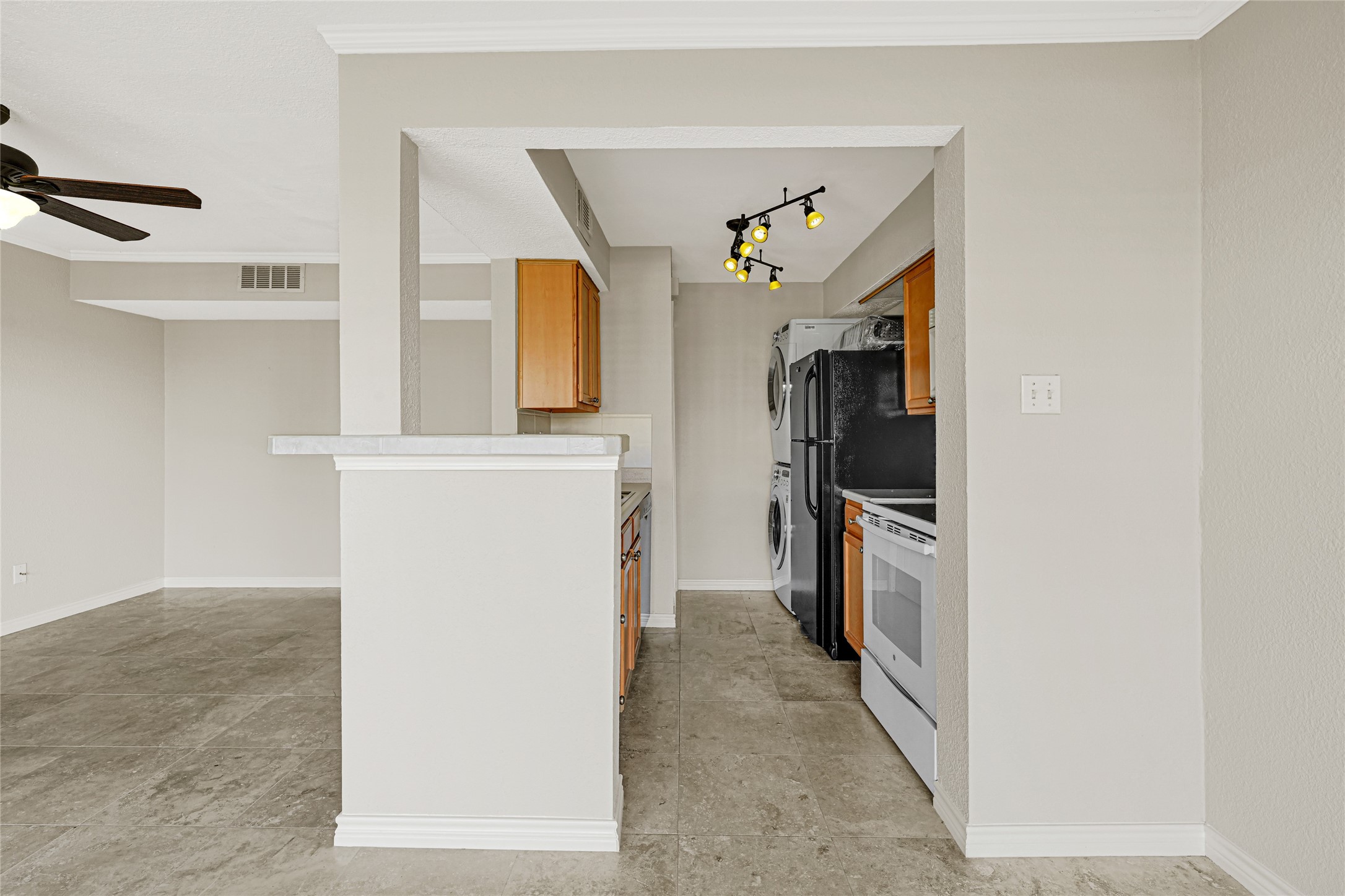 4011 NASA Road 1, Unit 406 El Lago, TX 77586 - Photo 8 of 23 a view of a hallway view with wooden floor and staircase