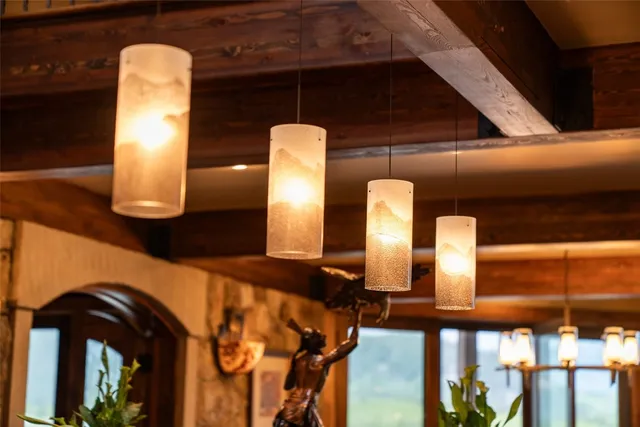 a spacious bathroom with a sink and mirror