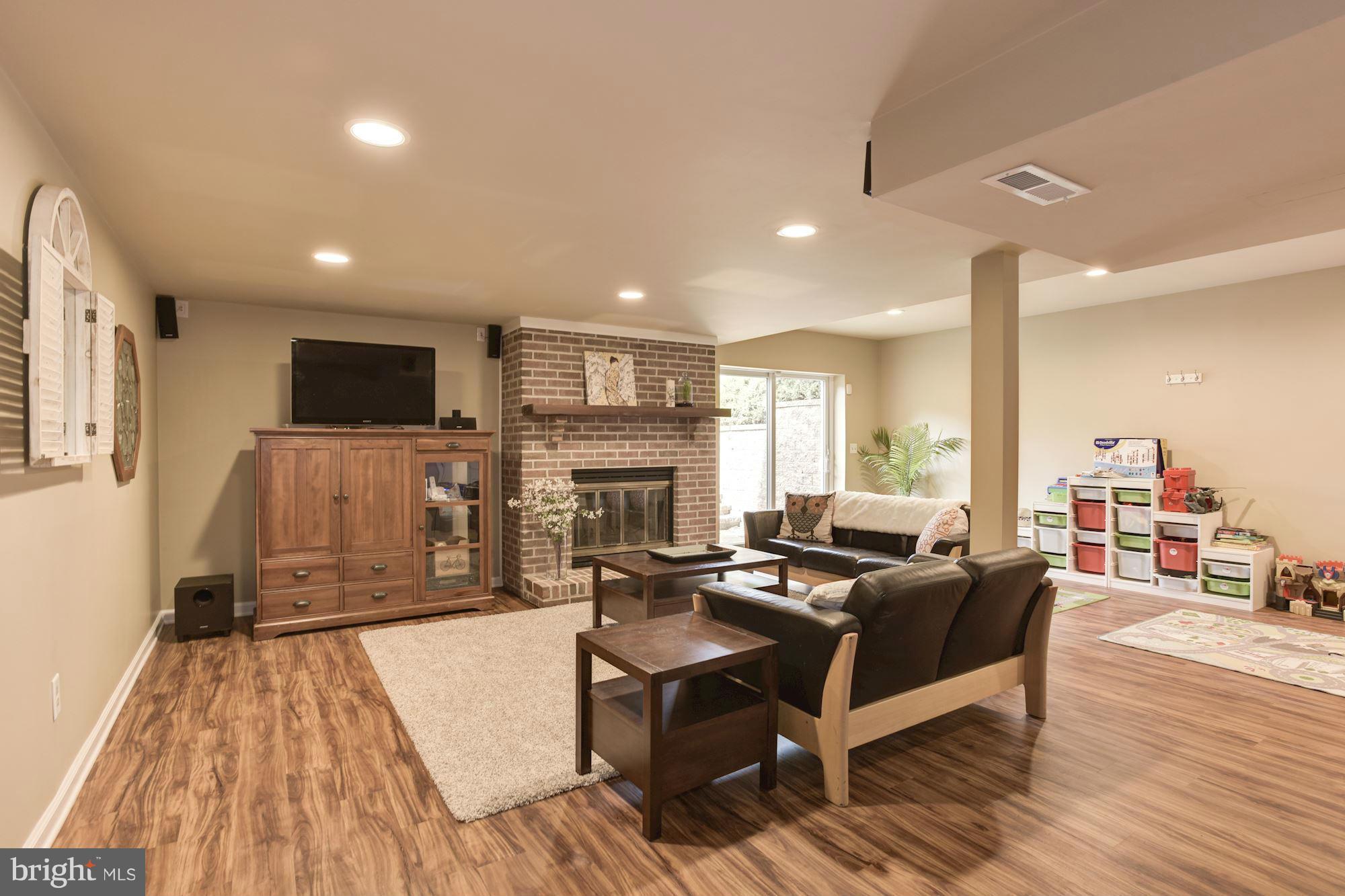 3001 Jackson Ridge Court Phoenix, MD 21131 - Photo 21 of 30 Sunny Lower Level Rec Room w/WB Fireplace