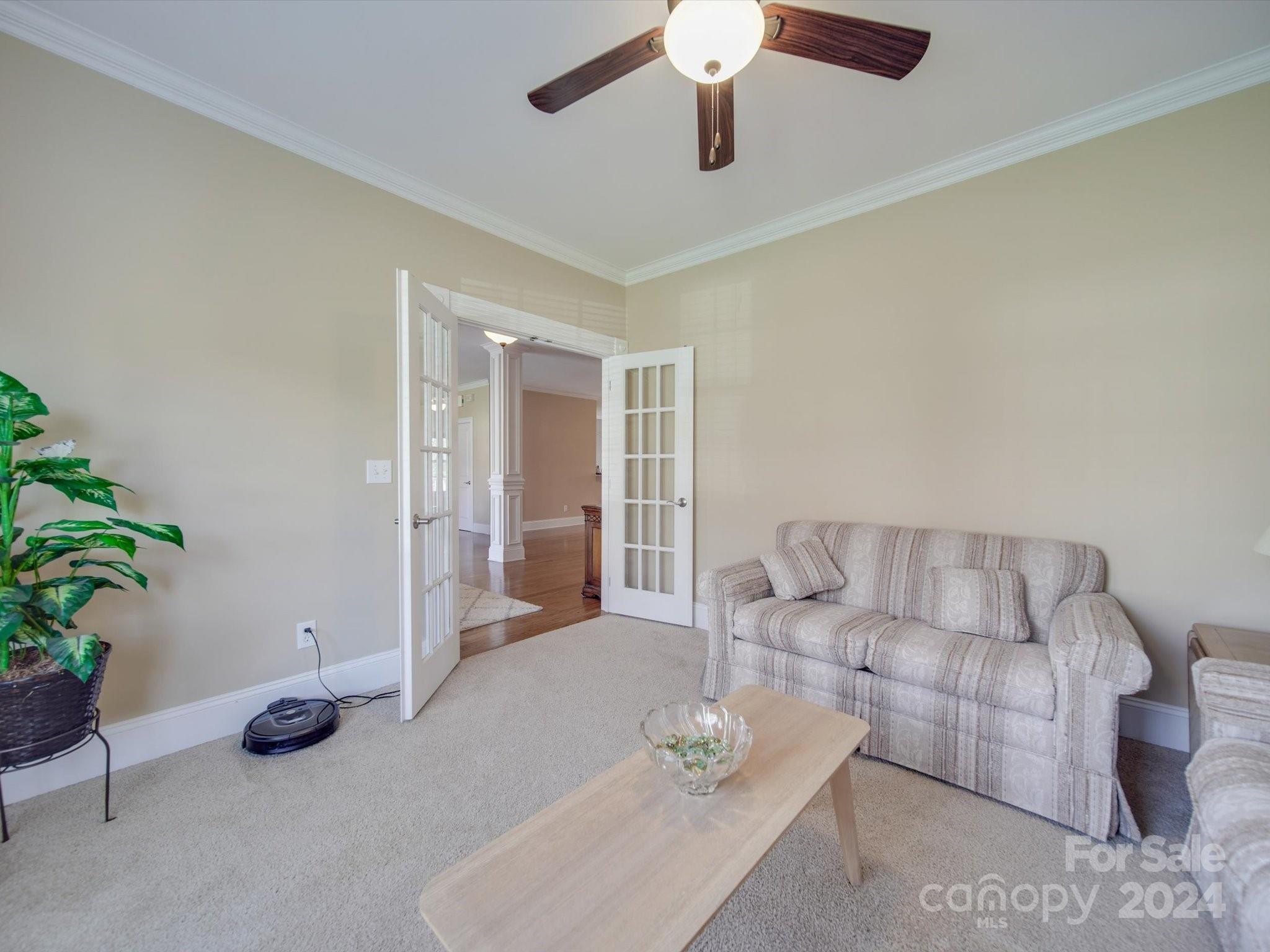19617 Coachmans Trace Cornelius, NC 28031 - Photo 15 of 46 a view of livingroom with furniture and ceiling fan