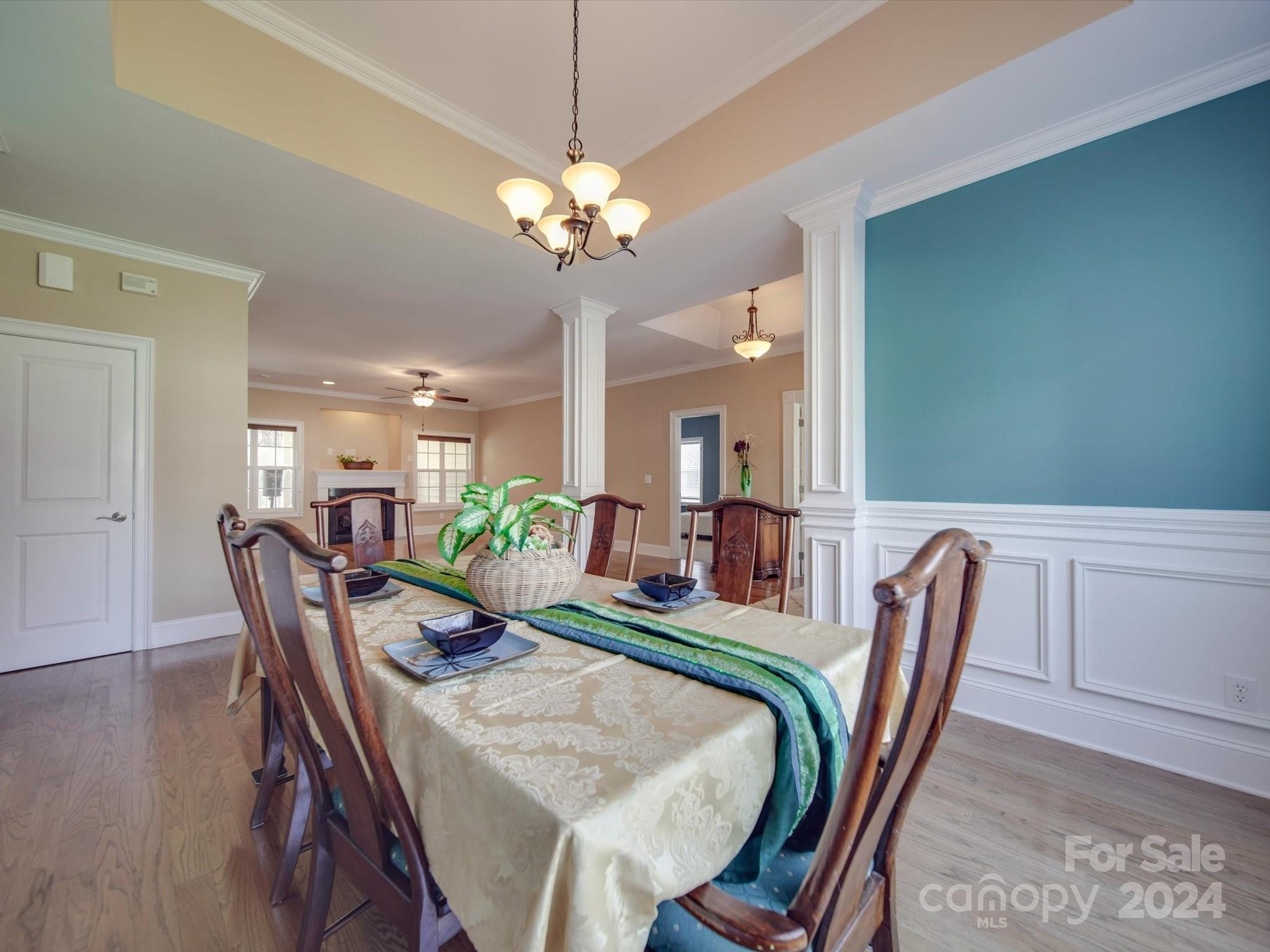 19617 Coachmans Trace Cornelius, NC 28031 - Photo 18 of 46 a view of a dining room with furniture