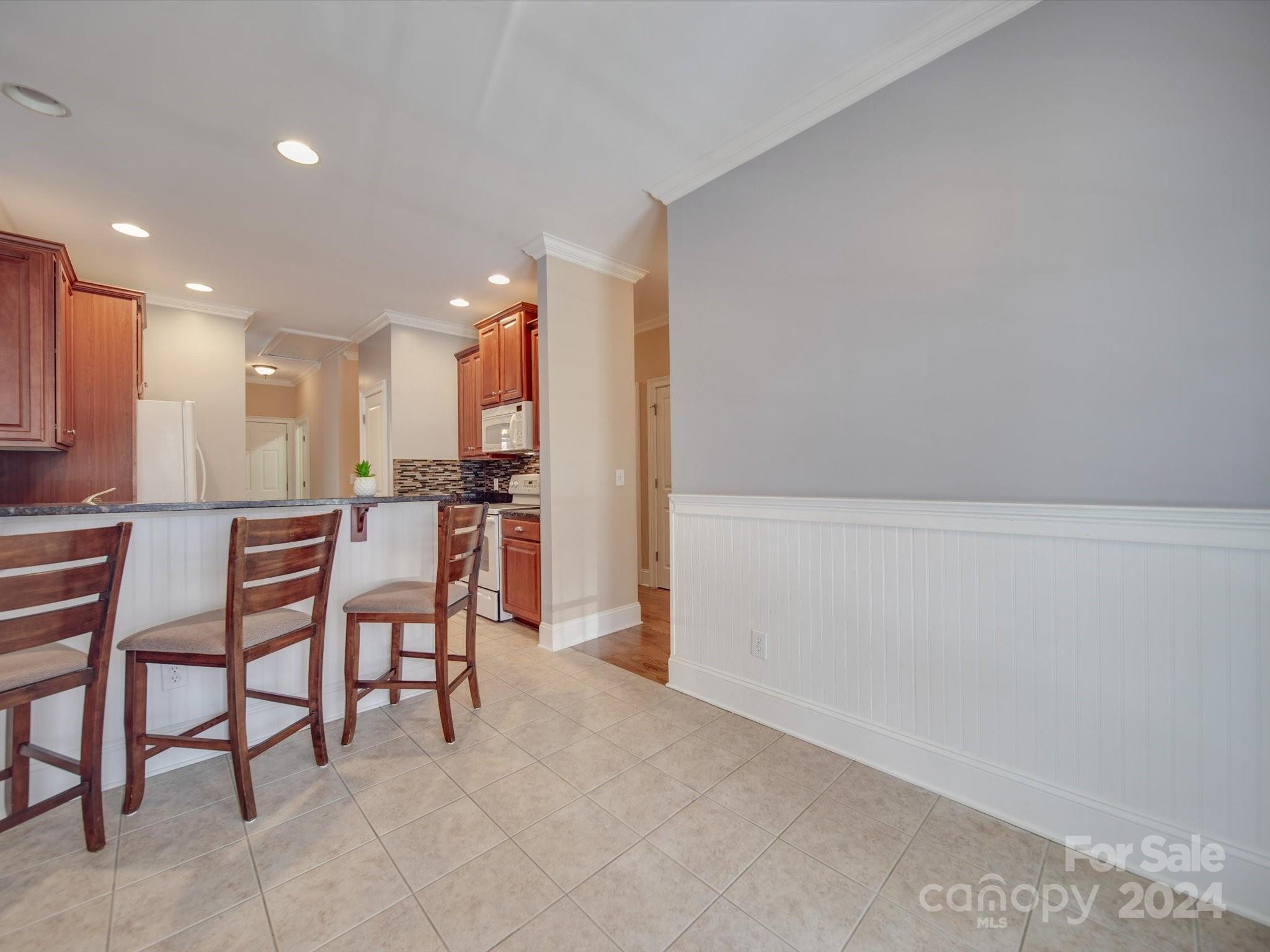 19617 Coachmans Trace Cornelius, NC 28031 - Photo 22 of 46 a view of kitchen with furniture and window