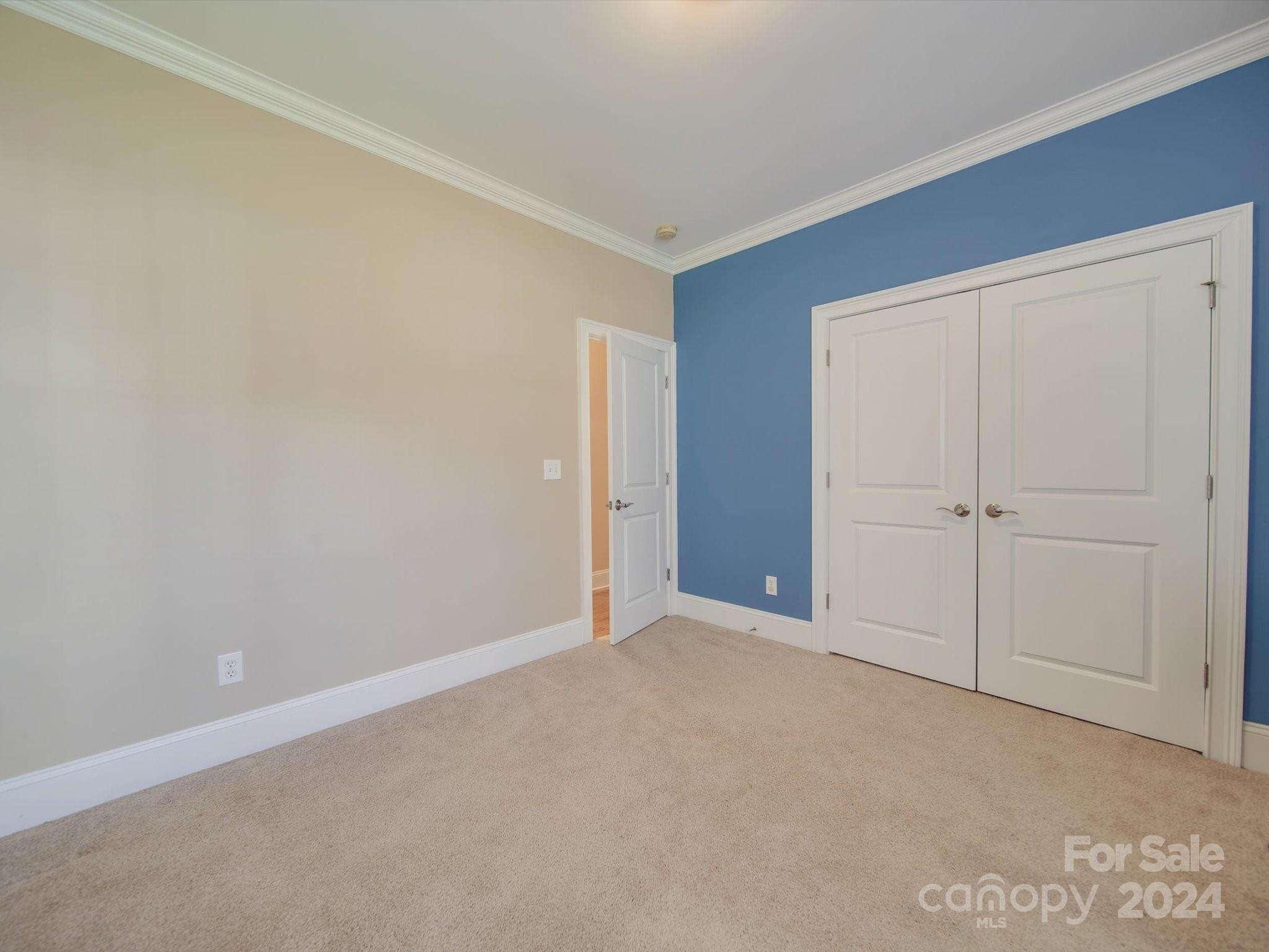 19617 Coachmans Trace Cornelius, NC 28031 - Photo 33 of 46 a view of an empty room