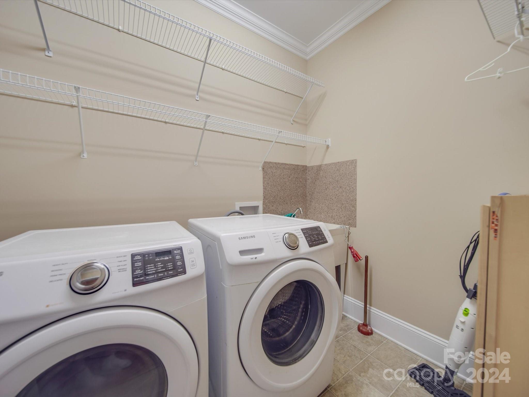 19617 Coachmans Trace Cornelius, NC 28031 - Photo 34 of 46 a utility room with dryer and washer