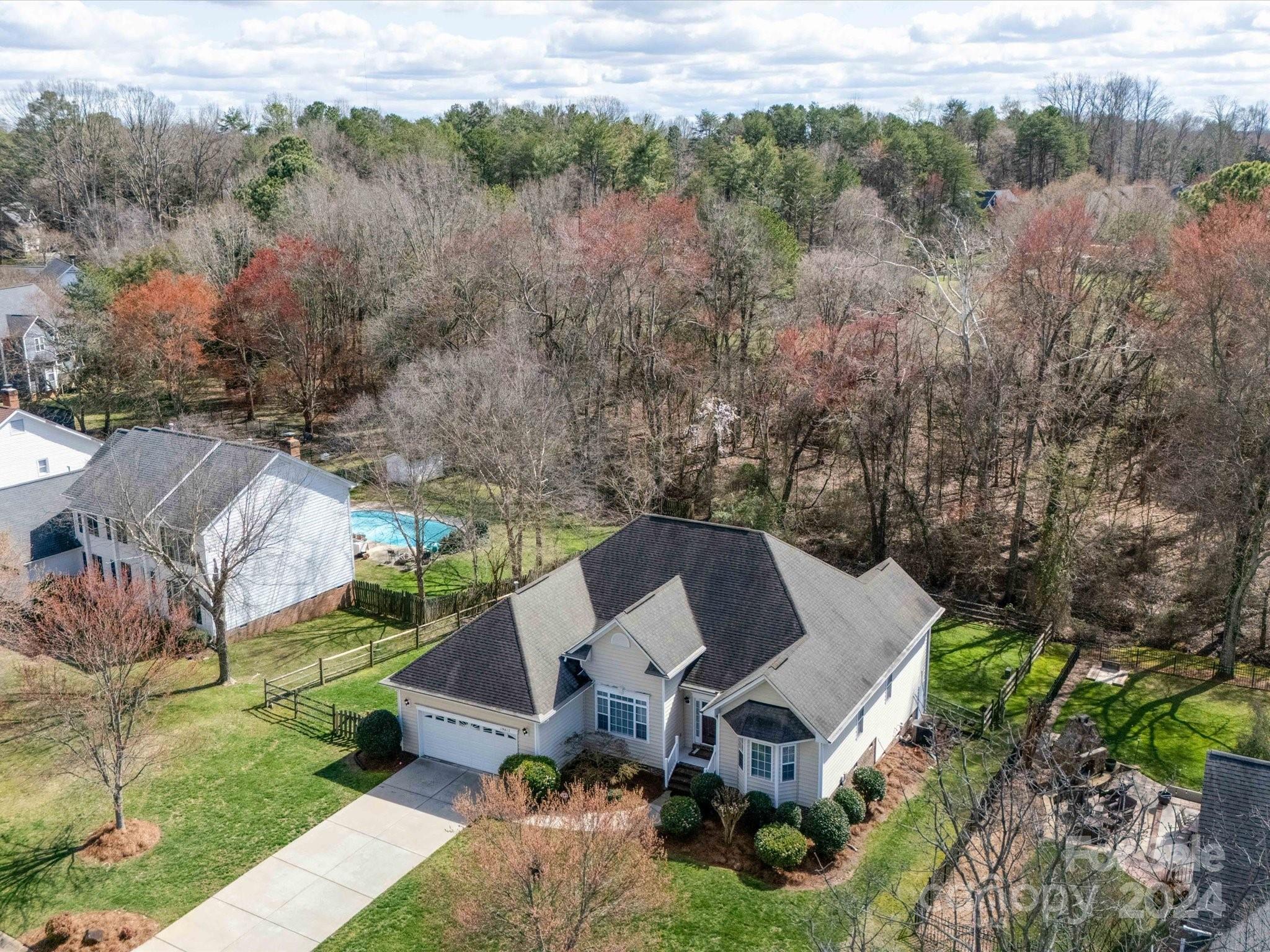 19617 Coachmans Trace Cornelius, NC 28031 - Photo 38 of 46 an aerial view of a house with a yard