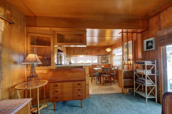 a view of a chairs and table in a patio