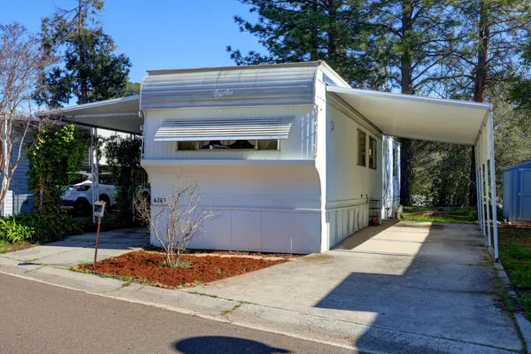 a view of a house with a garage
