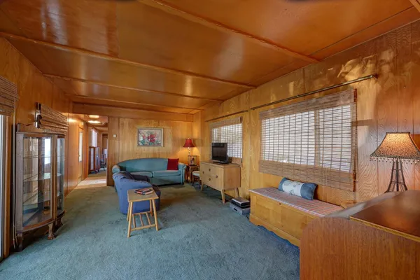 a workspace with furniture and a window