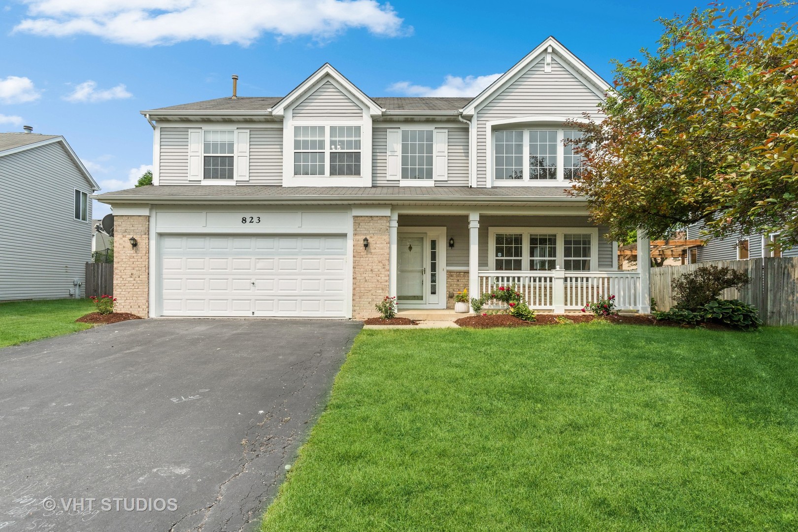 823 Fieldcrest Drive Naperville, IL 60540 - Photo 1 of 30 a front view of a house with yard