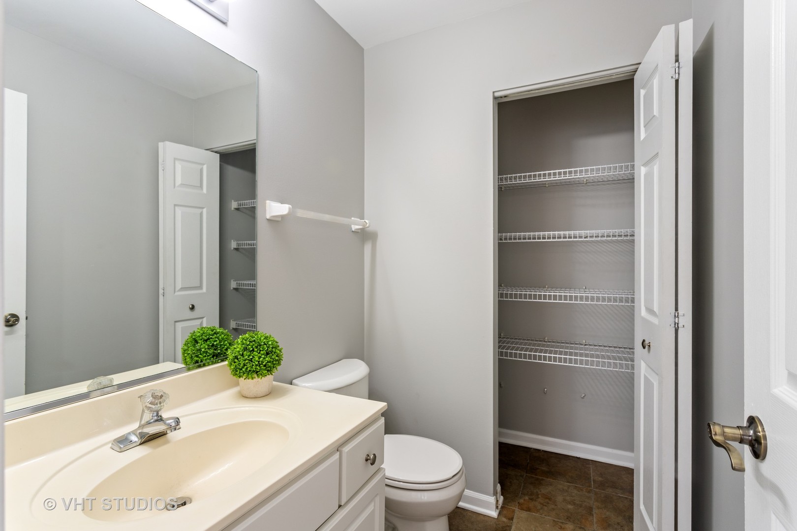 823 Fieldcrest Drive Naperville, IL 60540 - Photo 11 of 30 a bathroom with a sink toilet and shower