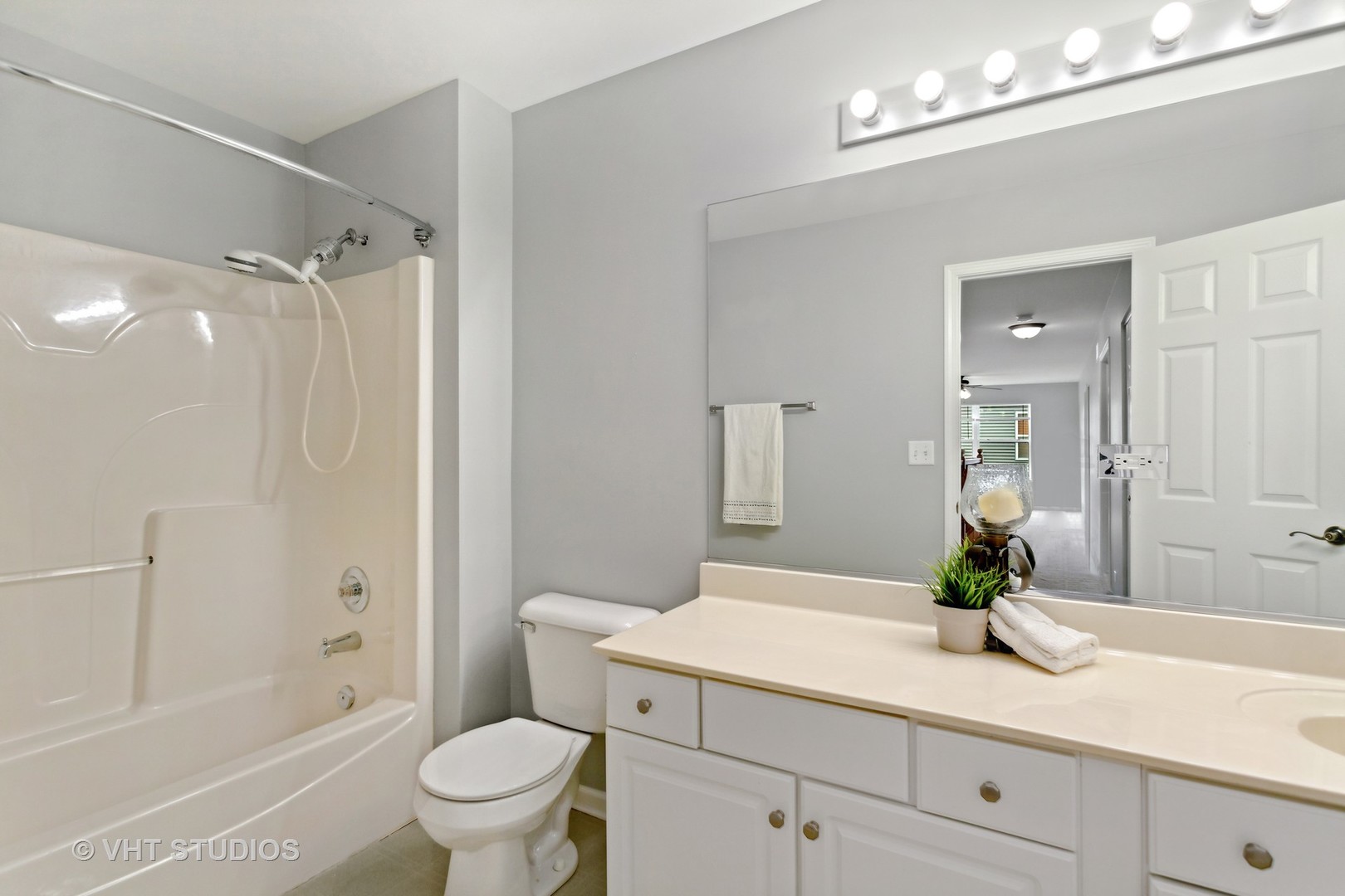 823 Fieldcrest Drive Naperville, IL 60540 - Photo 22 of 30 a bathroom with a sink a toilet and shower