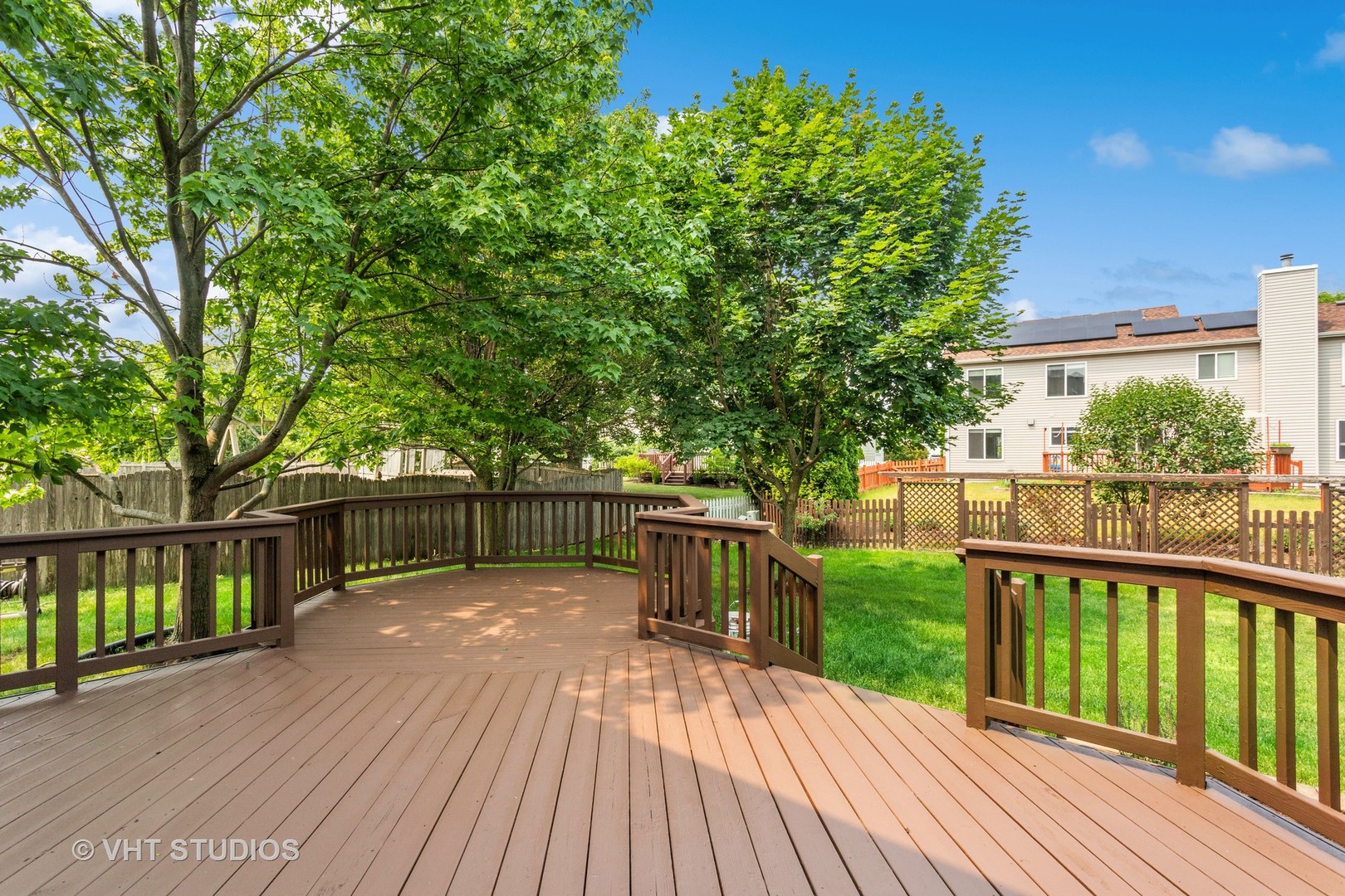 823 Fieldcrest Drive Naperville, IL 60540 - Photo 25 of 30 a view of a deck with a large garden