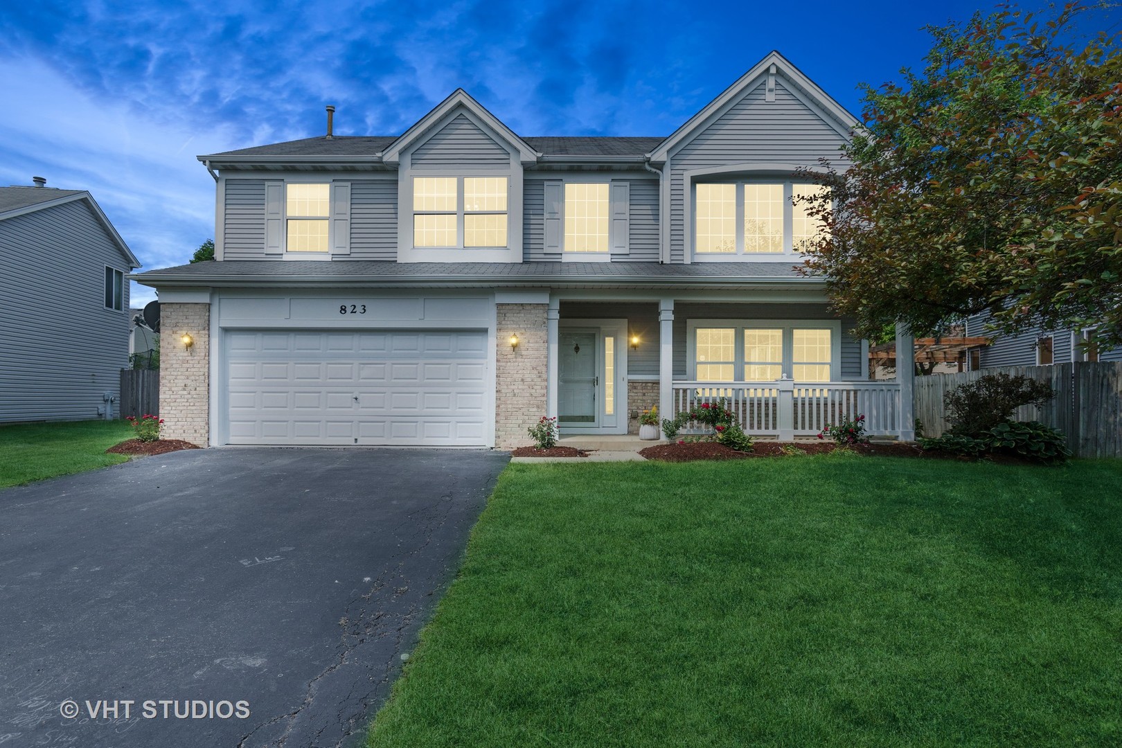 823 Fieldcrest Drive Naperville, IL 60540 - Photo 30 of 30 a front view of a house with a yard