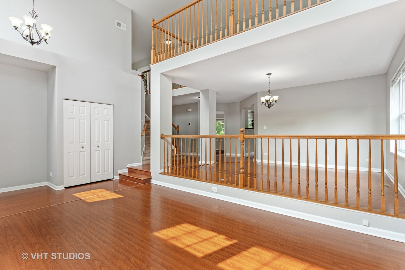 823 Fieldcrest Drive Naperville, IL 60540 - Photo 4 of 30 a view of a hallway with wooden floor