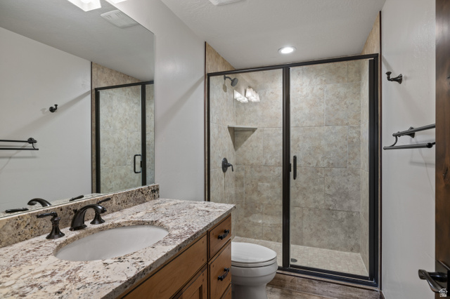 707 Chimney Rock Road, Unit 247 Heber City, UT 84032 - Photo 35 of 64 Bathroom with vanity and a shower stall