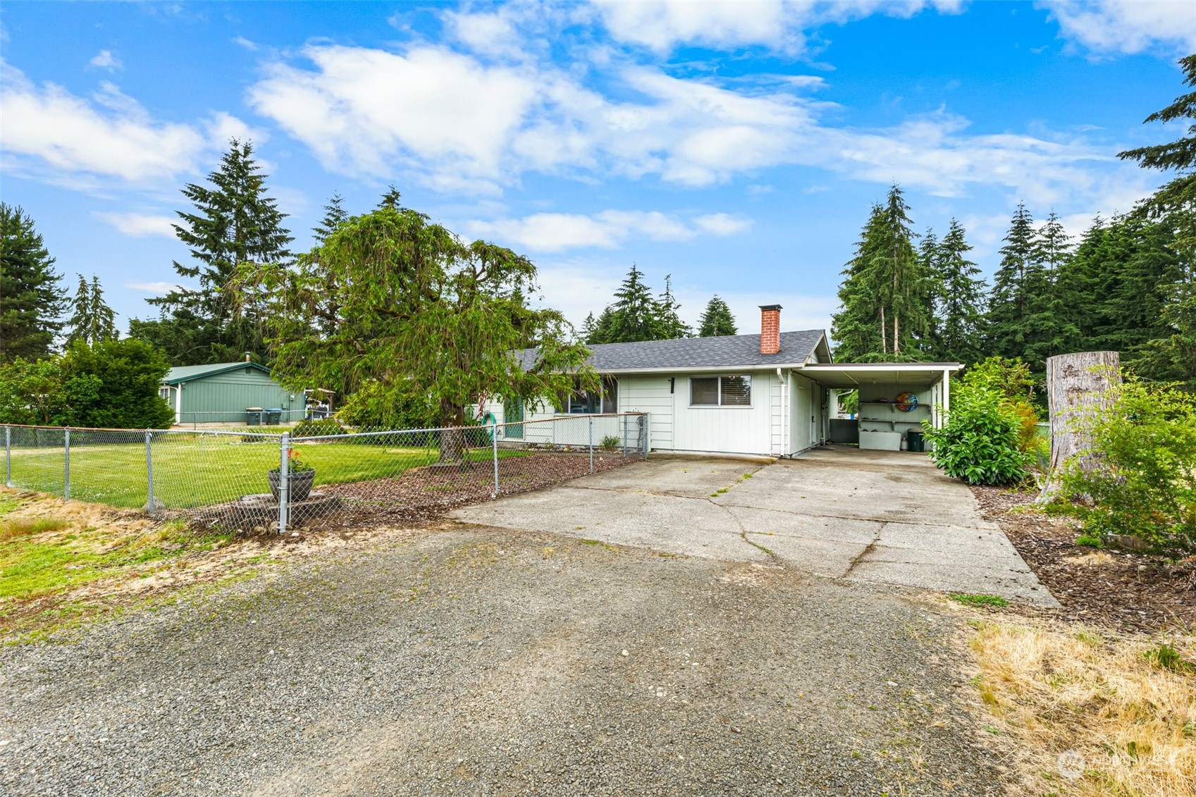 19131 Rosemary Street Southwest Rochester, WA 98579 - Photo 1 of 36 a view of a house with a yard