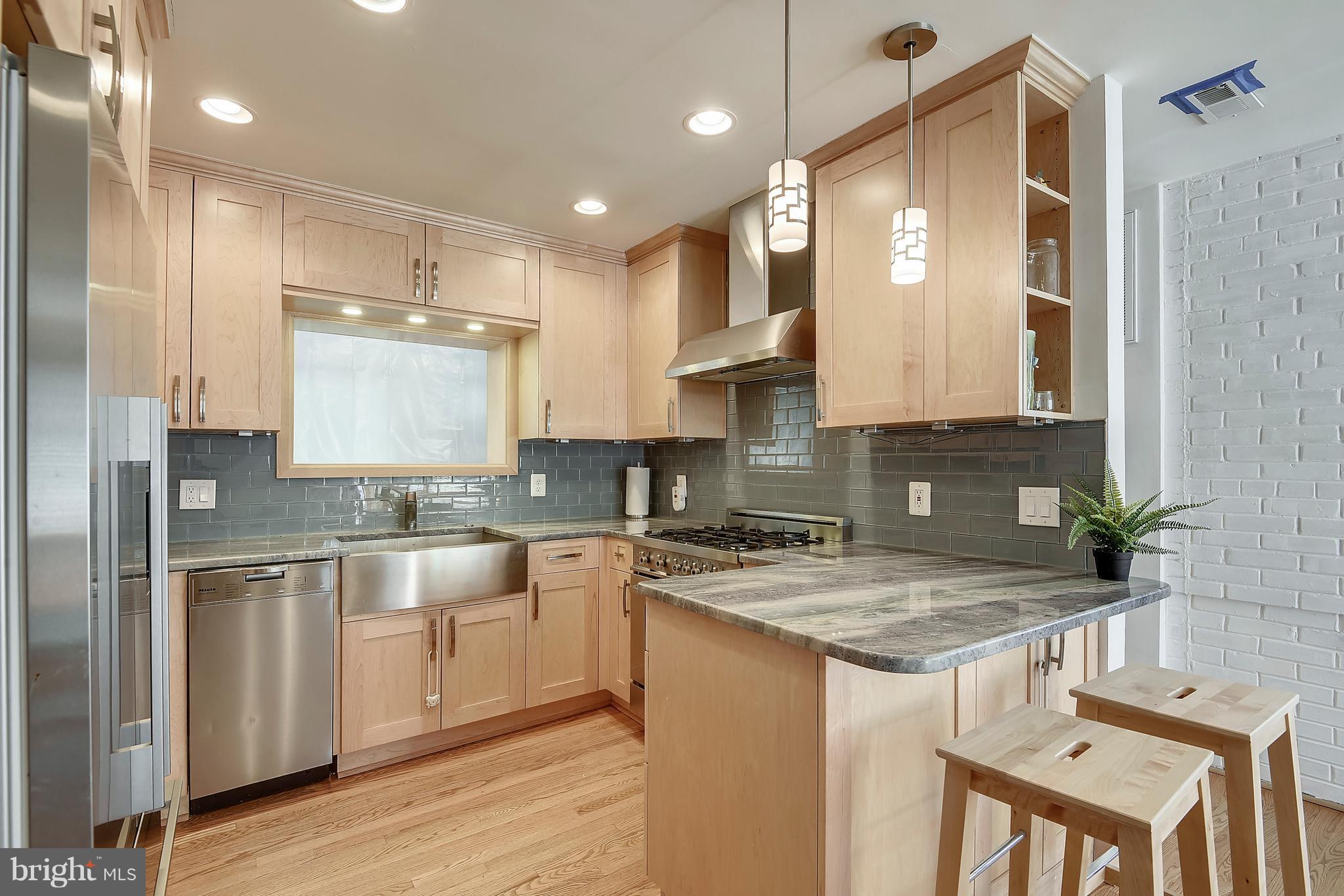 8716 Ridge Road Bethesda, MD 20817 - Photo 3 of 28 Granite Kitchen with Stainless Steel Appliances