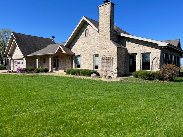 927 Dickson Road Bristol, IL 60560 - Photo 2 of 9 a front view of house with yard and green space