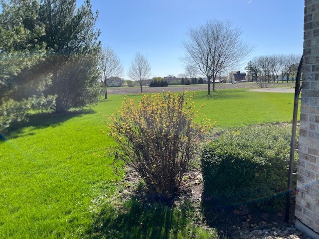 927 Dickson Road Bristol, IL 60560 - Photo 4 of 9 a view of a lake with a big yard