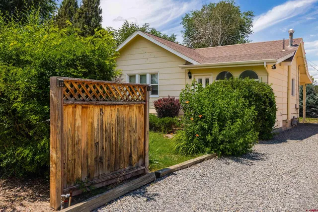 a view of a back yard of the house
