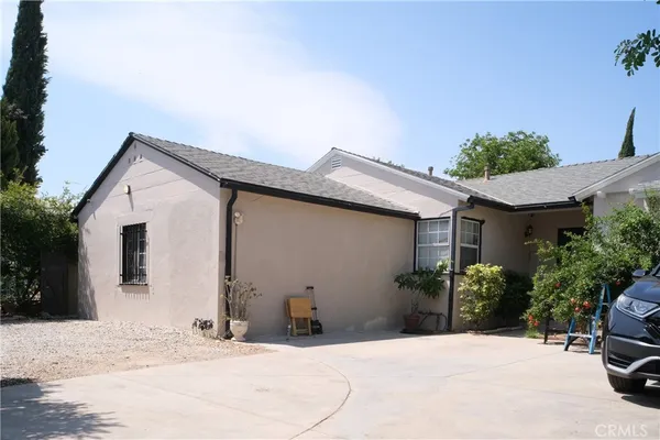 a view of a house with a patio