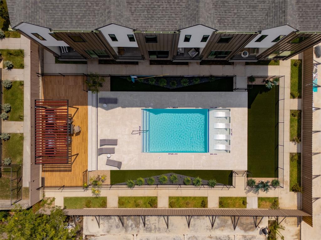 1902 North Carroll Avenue, Unit 102 Dallas, TX 75204 - Photo 3 of 29 a view of building with an outdoor space