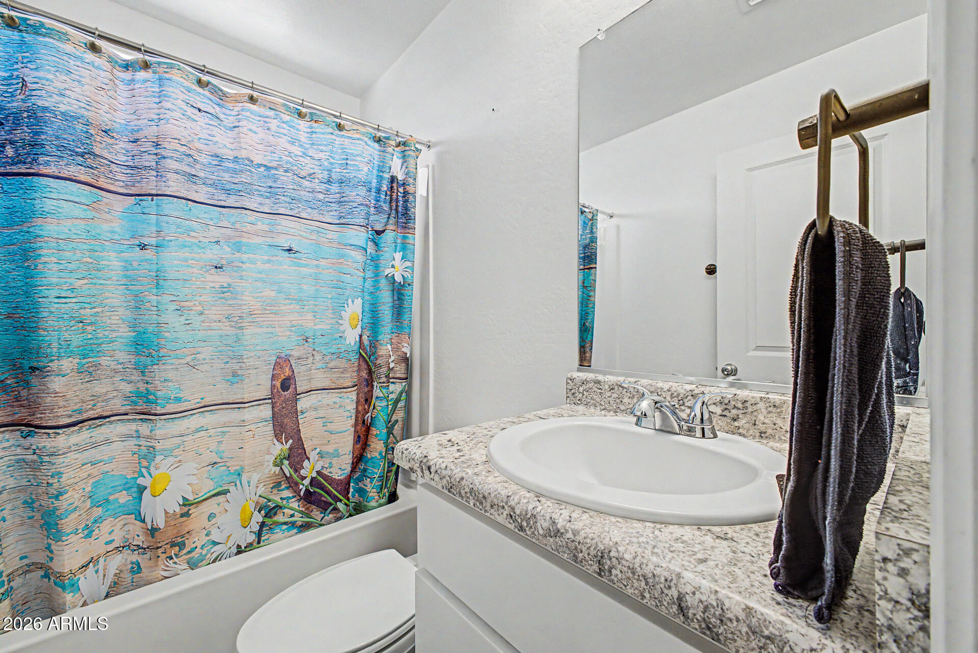 1673 Inca Drive Coolidge, AZ 85128 - Photo 34 of 43 a bathroom with a granite countertop sink a toilet and shower