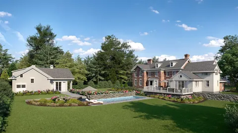 a aerial view of a house with a garden and plants