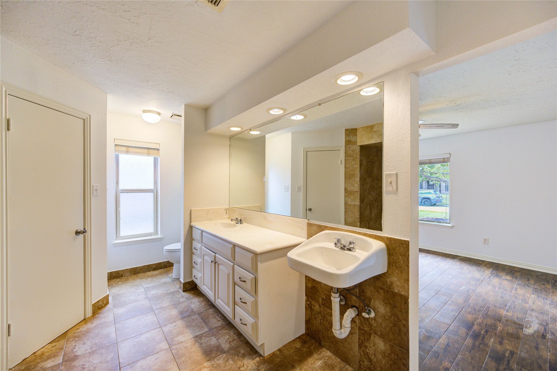 3639 Fir Forest Drive Spring, TX 77388 - Photo 26 of 44 a bathroom with a tub sink and mirror