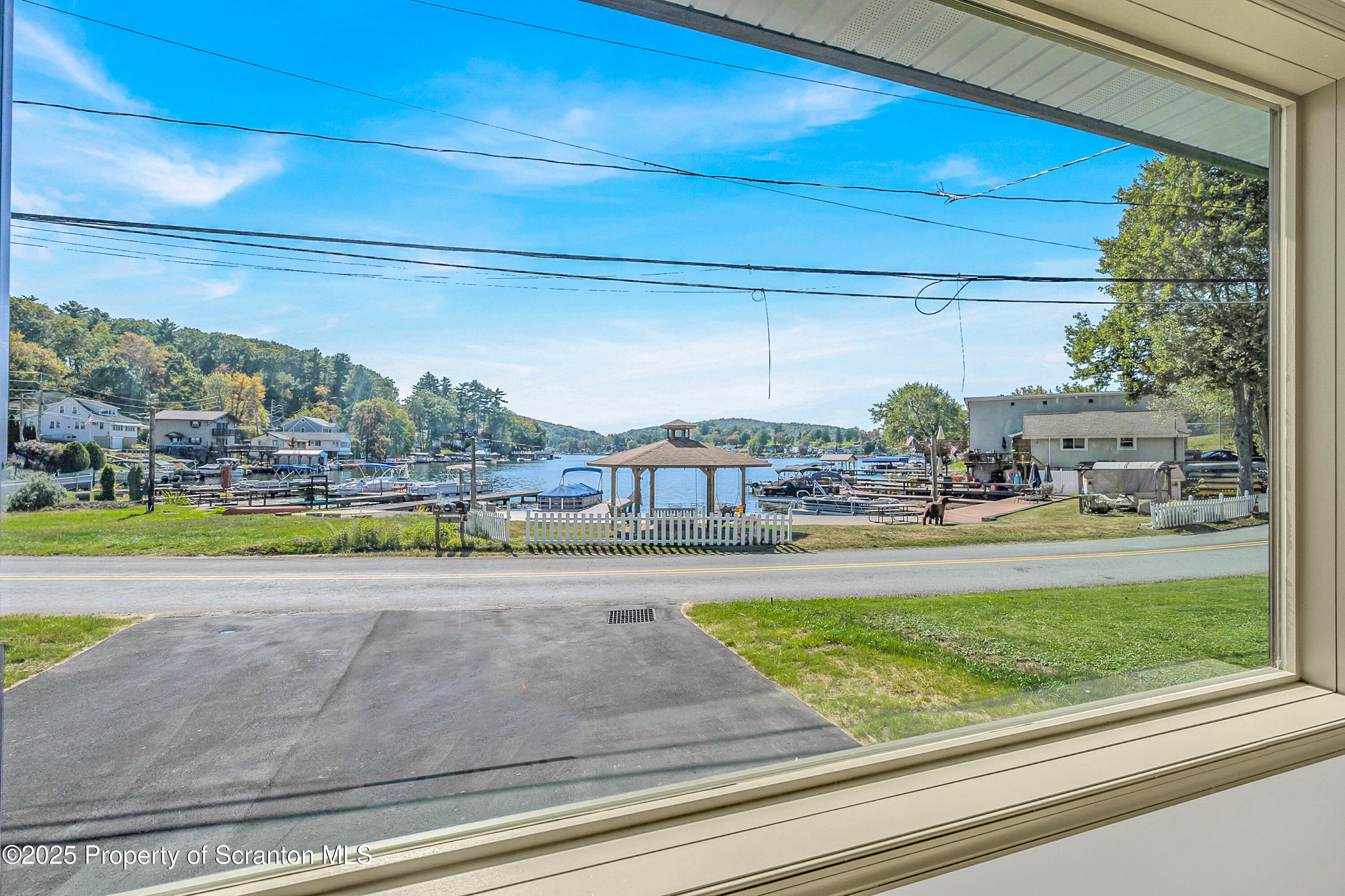 1262 Lake Road Lake Winola, PA 18419 - Photo 14 of 33 a view of swimming pool from a window