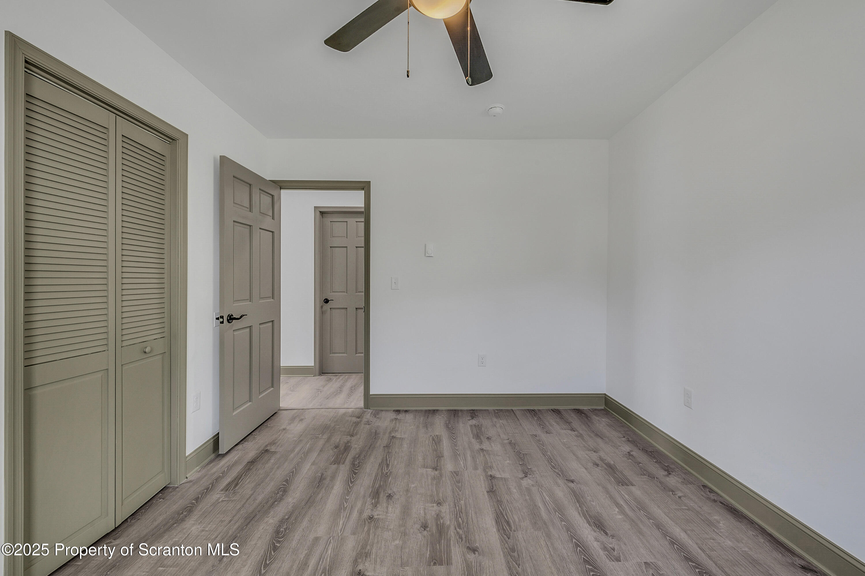 1262 Lake Road Lake Winola, PA 18419 - Photo 20 of 33 a view of empty room with wooden floor