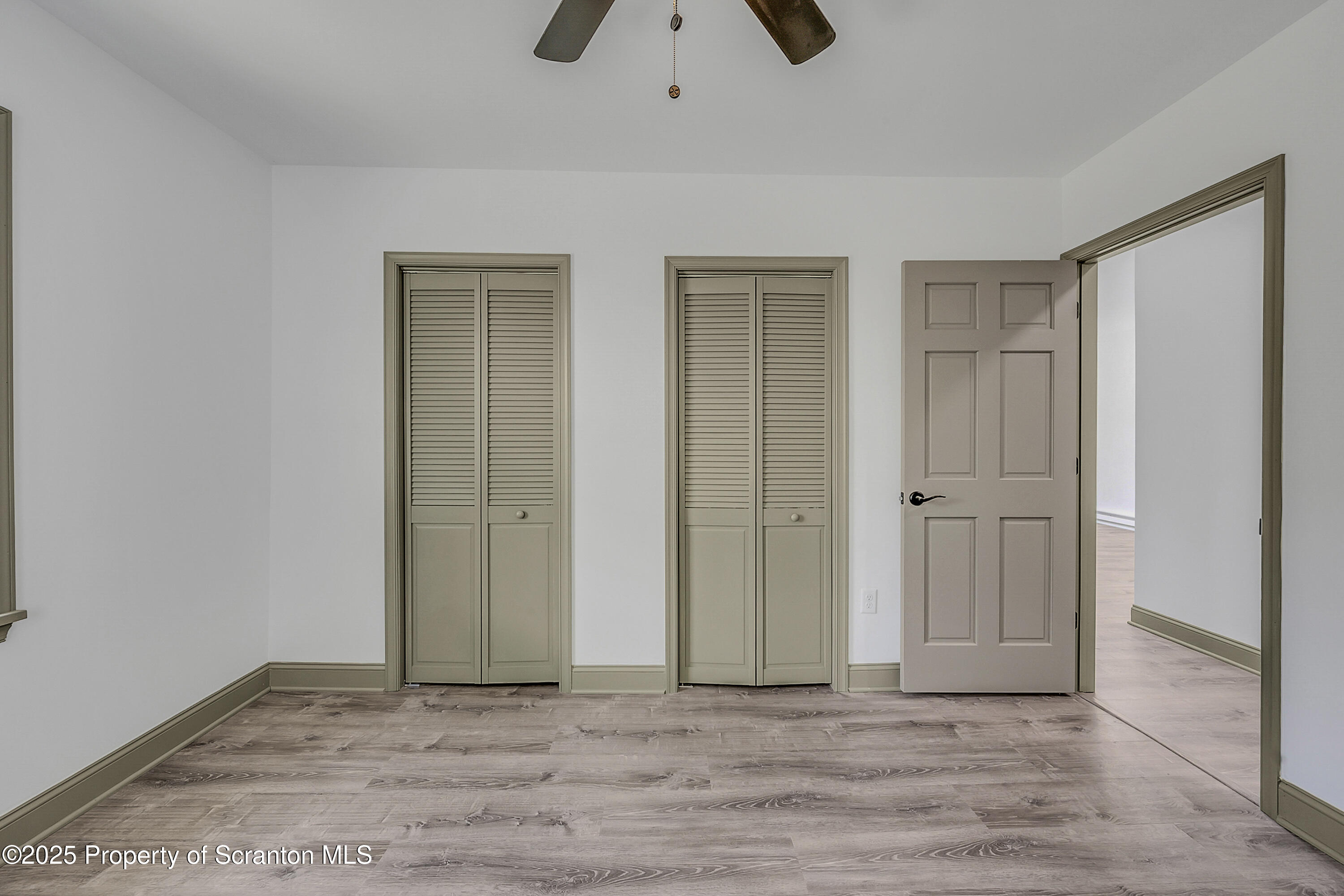 1262 Lake Road Lake Winola, PA 18419 - Photo 21 of 33 a view of an empty room with wooden floor
