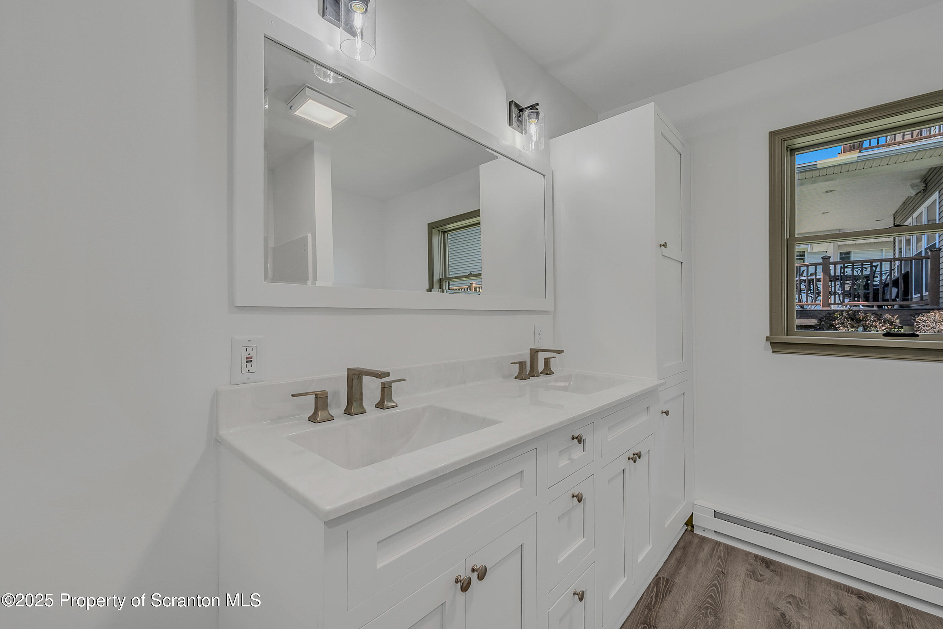 1262 Lake Road Lake Winola, PA 18419 - Photo 24 of 33 a bathroom with a sink and a mirror
