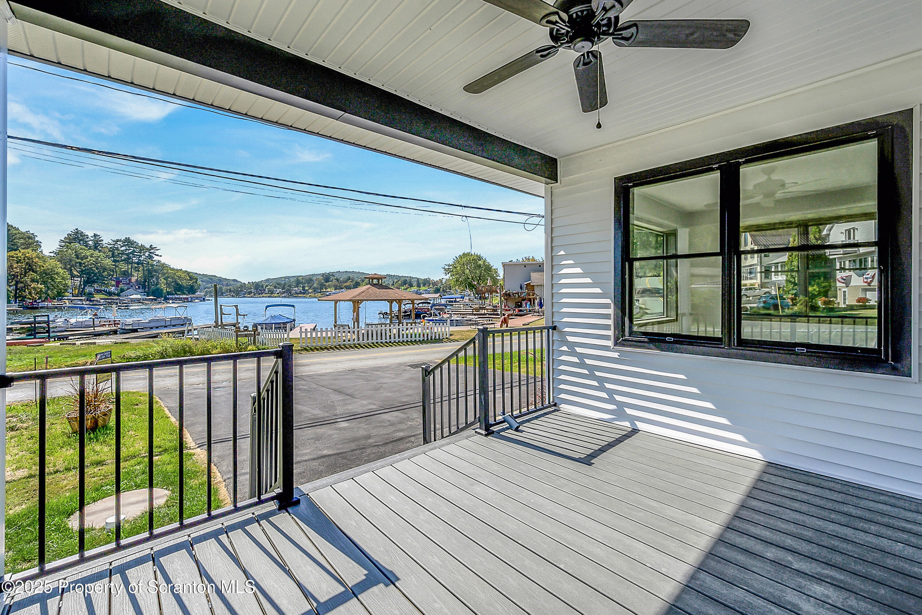 1262 Lake Road Lake Winola, PA 18419 - Photo 6 of 33 a view of balcony with wooden floor