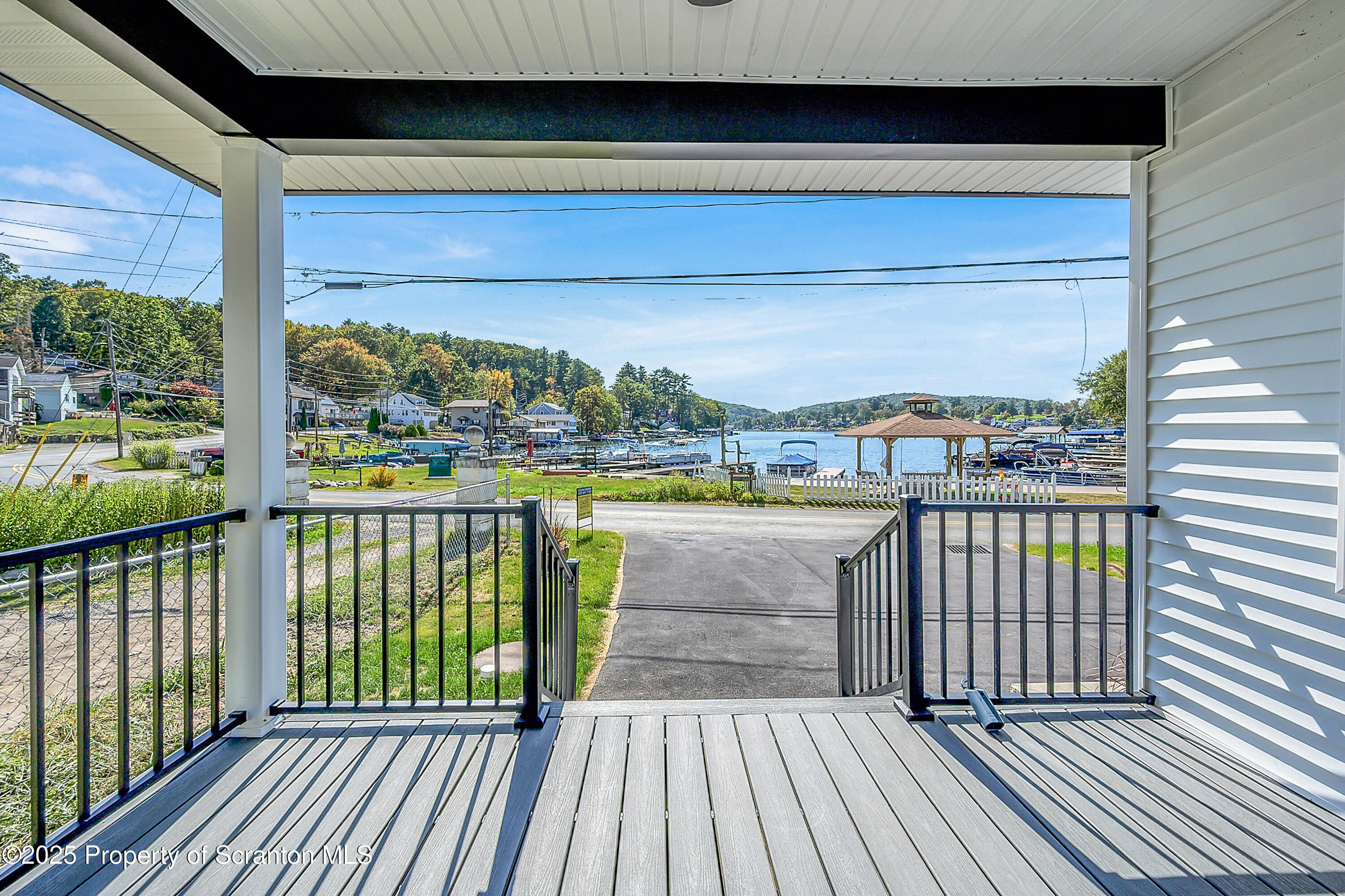 1262 Lake Road Lake Winola, PA 18419 - Photo 7 of 33 a view of balcony with wooden floor