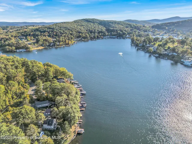 a view of a lake with mountains in the background