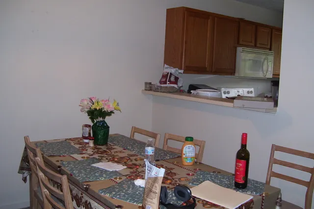 a view of a workspace with furniture