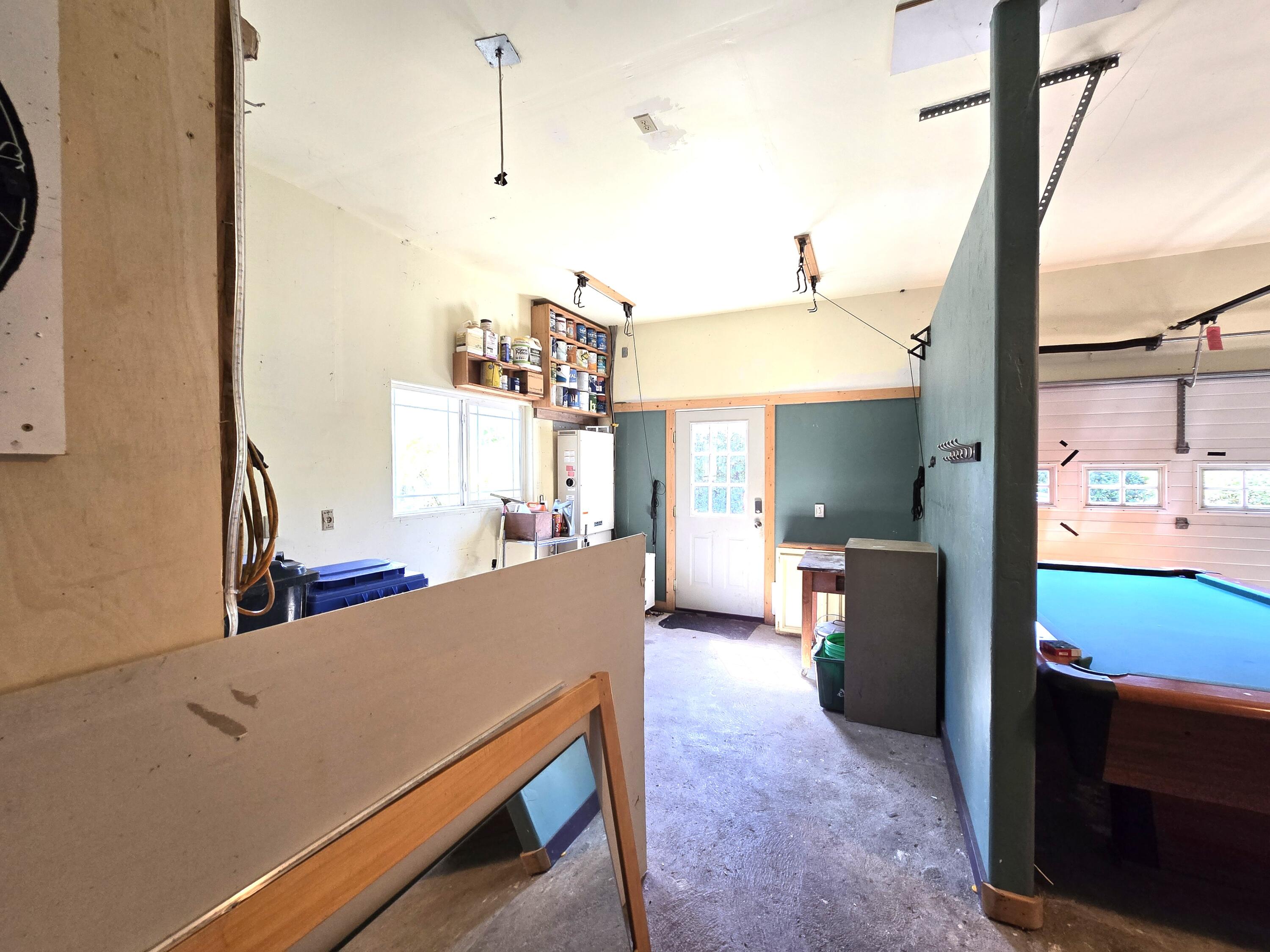 1945 Grange Road McKinleyville, CA 95519 - Photo 59 of 62 a living room with kitchen island furniture and a window