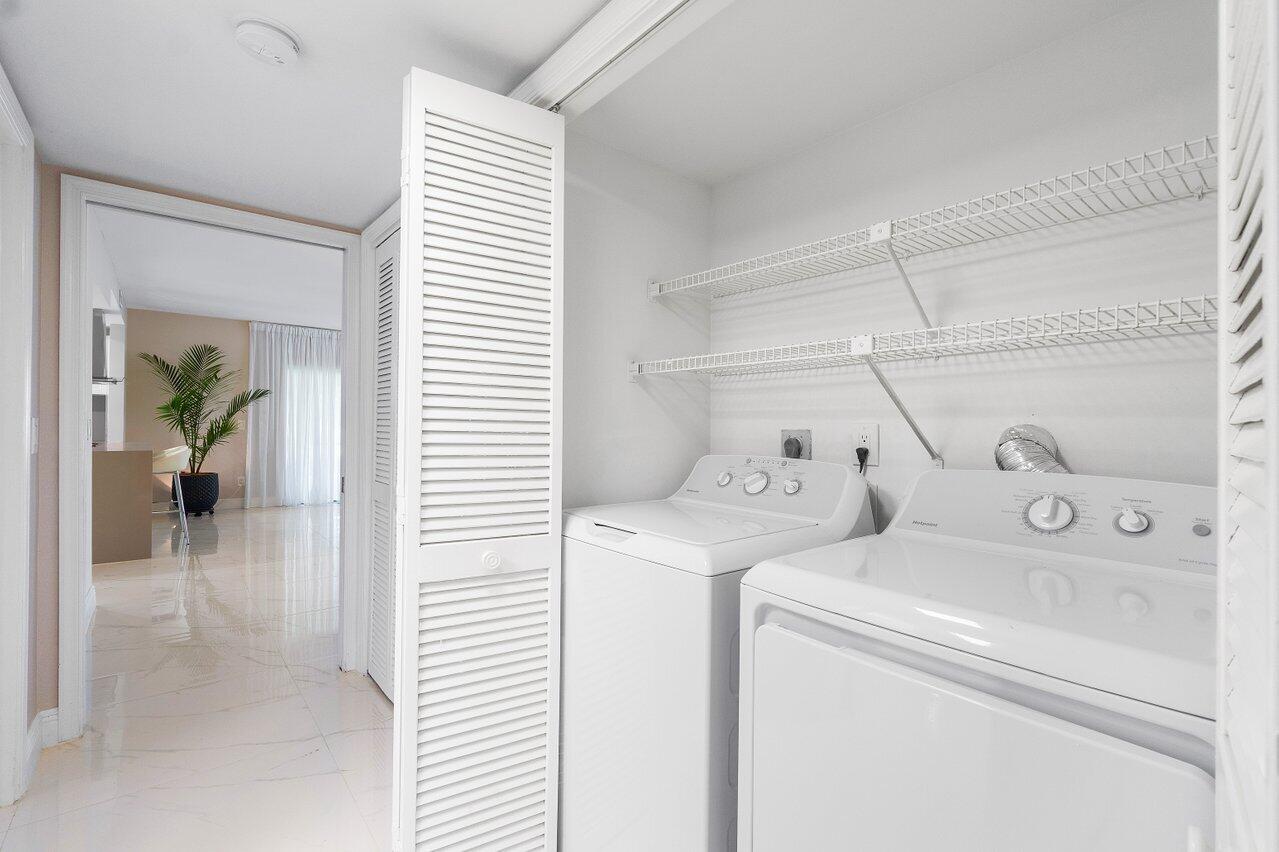 13380 Polo Road West, Unit A105 Wellington, FL 33414 - Photo 22 of 27 Laundry
