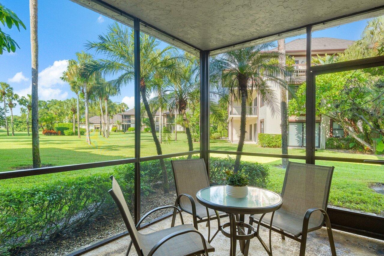 13380 Polo Road West, Unit A105 Wellington, FL 33414 - Photo 23 of 27 Covered Screened Patio