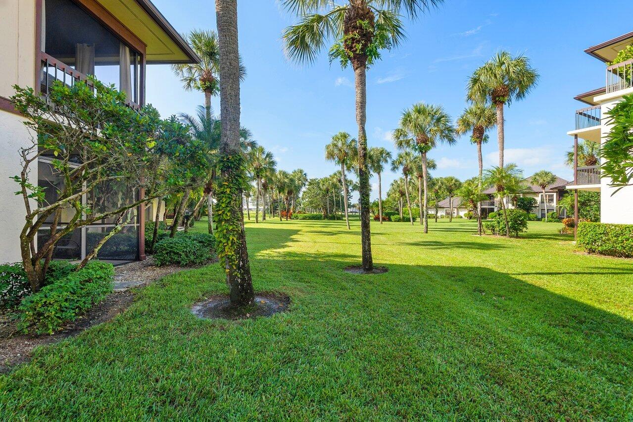 13380 Polo Road West, Unit A105 Wellington, FL 33414 - Photo 26 of 27 Exterior Rear