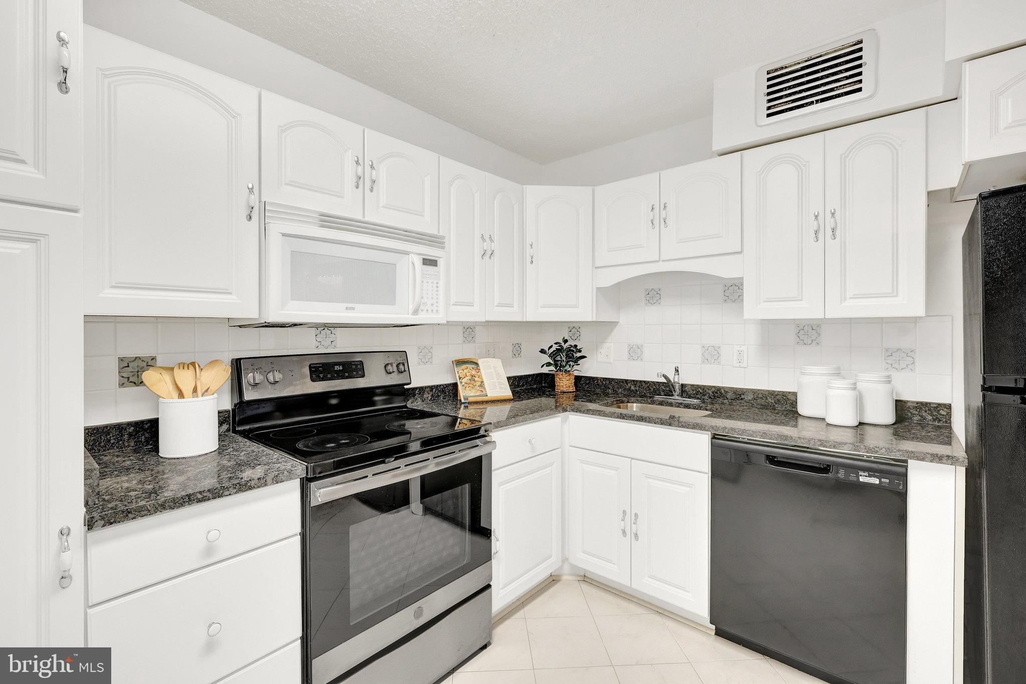 1800 Old Meadow Road, Unit 317 McLean, VA 22102 - Photo 19 of 49 Granite Counters