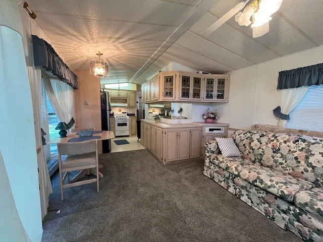 a bed room with a bed and a television