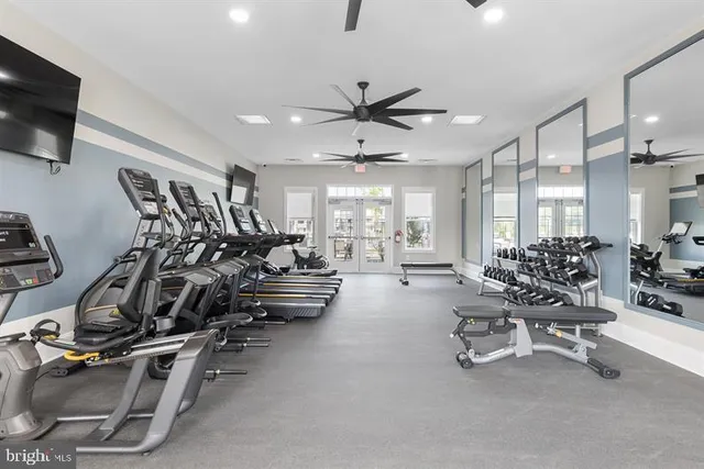 a view of a swimming pool with lounge chairs